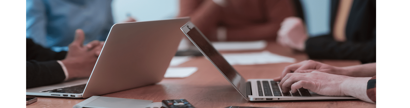 Successful team. Group of young multi-ethnic business people working and communicating together in creative office. Selective focus. High-quality photo